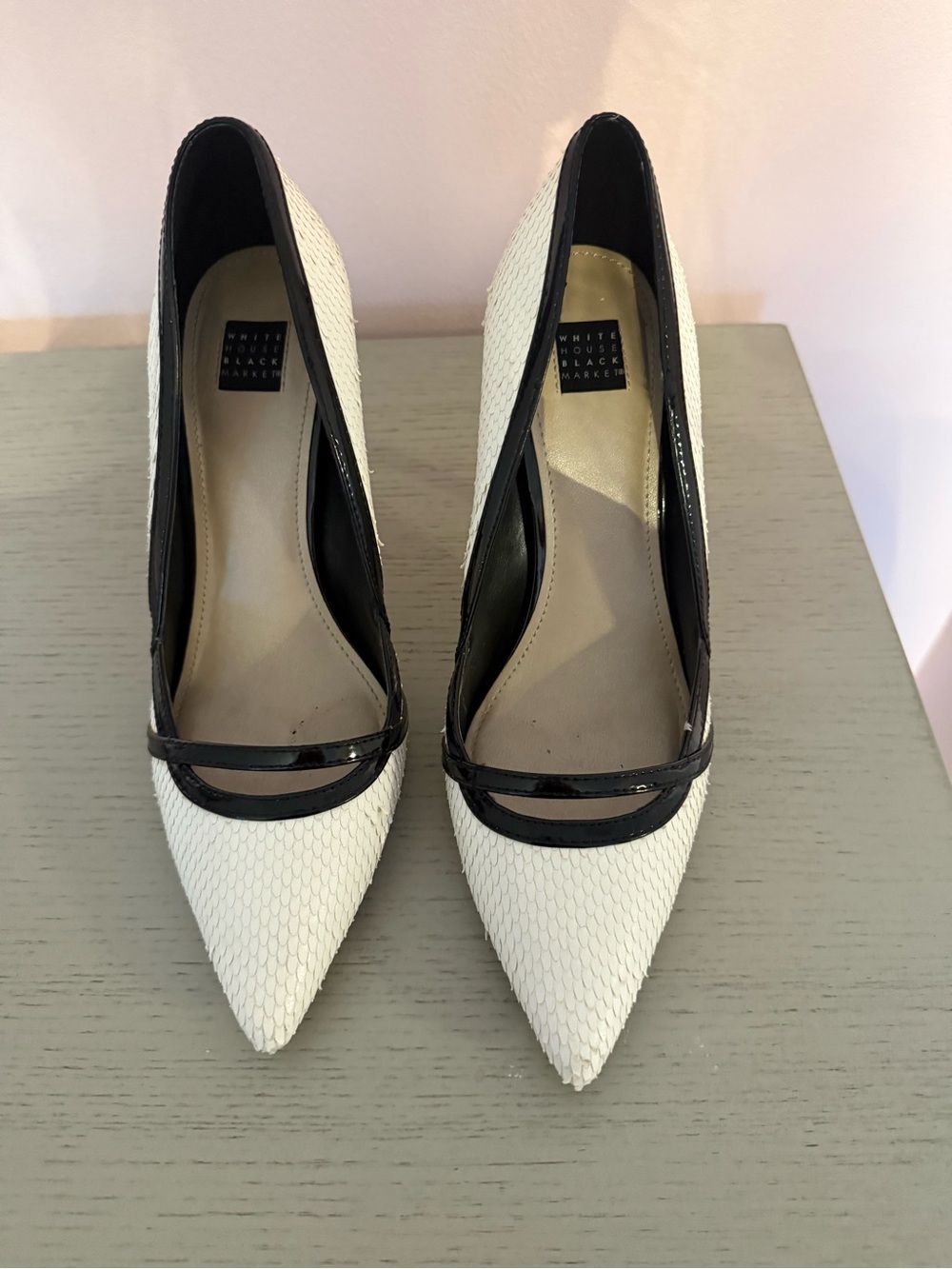 White House Black Market White Pointed-Toe Pumps with Black Trim